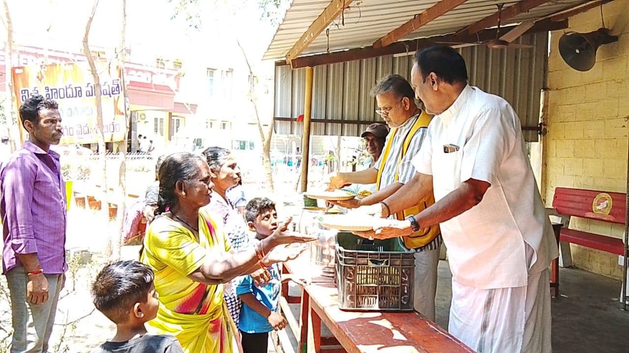 Volunteers cooking for community